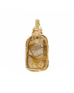 Load image into Gallery viewer, medium golden rutilated quartz amulet pendant