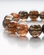 Load image into Gallery viewer, black golden super seven bracelet