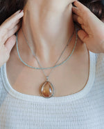 Load image into Gallery viewer, “rabbit hair” quartz pendant in silver setting