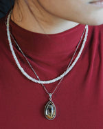 Load image into Gallery viewer, teardrop golden rutilated quartz pendant in silver setting