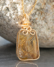 small trapezoid golden rutilated quartz pendant
