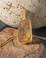 Load image into Gallery viewer, trapezoid golden rutilated quartz pendant
