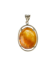 oval “rabbit hair” quartz pendant in silver setting