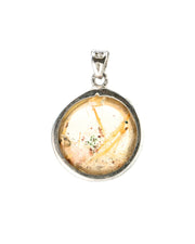 round golden rutilated quartz pendant in silver setting
