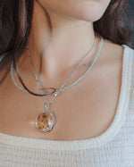 Load image into Gallery viewer, seabed world phantom quartz pendant in silver setting
