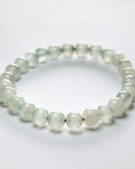 Load image into Gallery viewer, Green beaded bracelet on a white background
